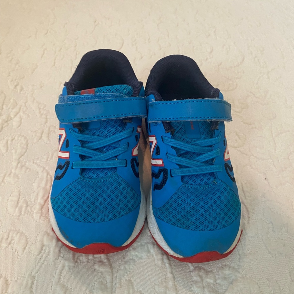 New Balance Kids Blue and Red Sneakers